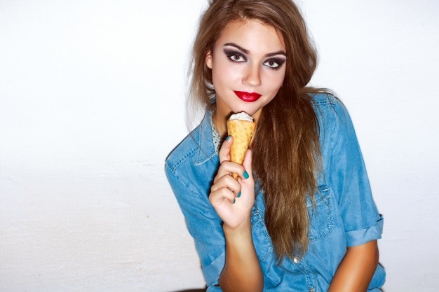 teenager-with-red-lips-eating-an-ice-cream_1140-135.jpg